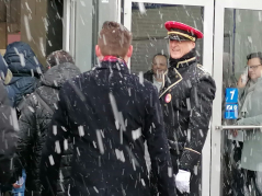 Doorman in a snowstorm, nice reception at the Hanover trade fair